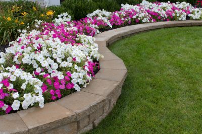 Create a Natural Barrier with a Flower Bed Installation!